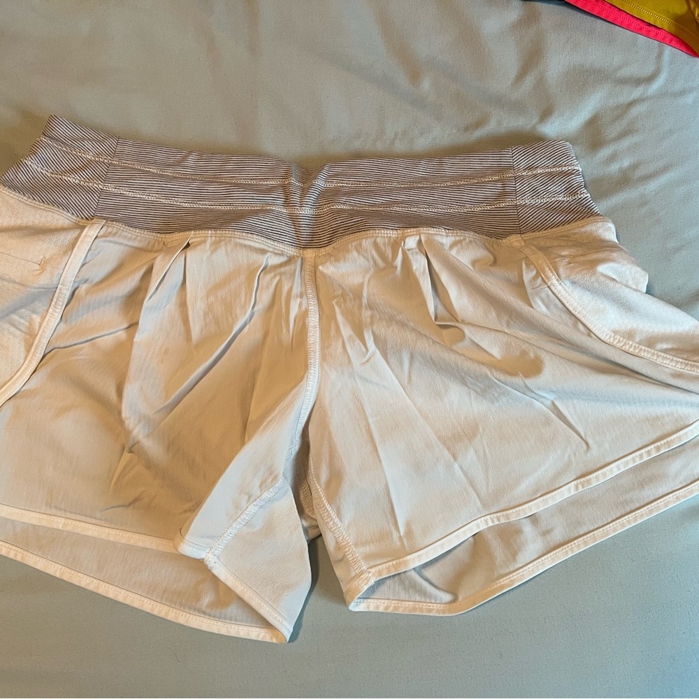 lululemon White Athletic Shorts with Elastic Waistband and Pleated Design